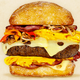 Illustration for article titled 10 mouthwatering cheeseburgers inspired by 10 American cities